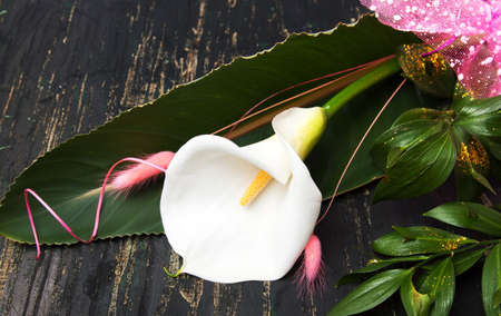 Calla Lily flower decorated bouquet on a tableの写真素材