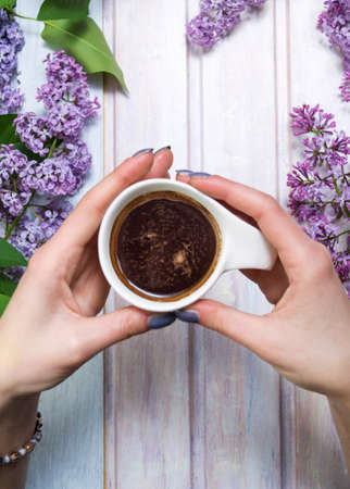 Girl having cup of coffee first personの写真素材