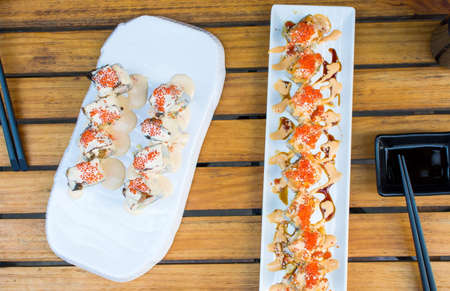 Sushi rolls on a plate in the restaurantの写真素材