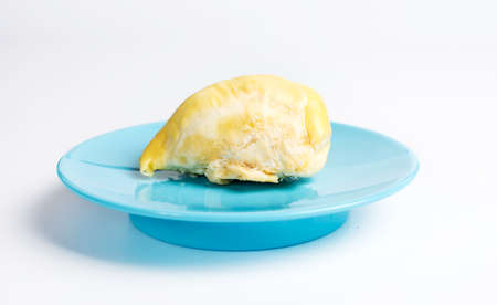 Durian fruit piece on a blue plateの写真素材