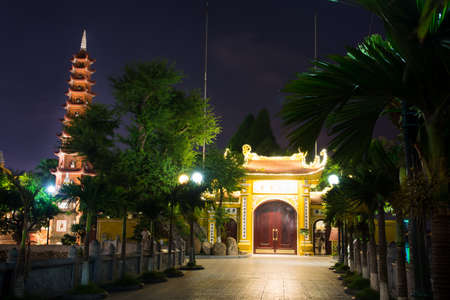 HANOI, VIETNAM - MAY 22, 2017: Tran Quoc pagoda, the oldest Buddhist temple in Hanoi, built in sixt century and located on a small island in the West Lakeのeditorial素材