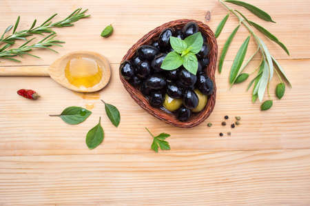 Olive oil with cooking ingredients and spicesの写真素材