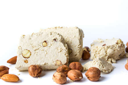 Hazelnut halva dessert slices on white backgroundの写真素材