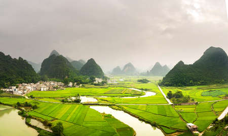 Stunning rice field view with karst formations in Guangxi, Chinaの写真素材