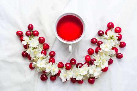 Cherry tea and fruit flatlay top viewの写真素材