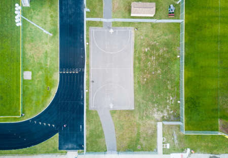 Basketball court and running tracks aerial birds eye view