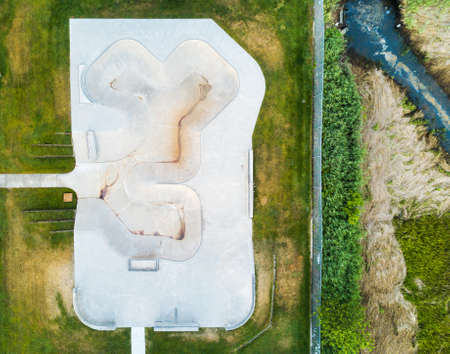 Empty skateboard and roller skates park aerial viewの写真素材