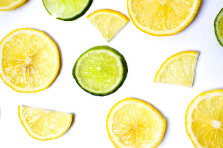 Lemon and lime slices on white backgroundの写真素材