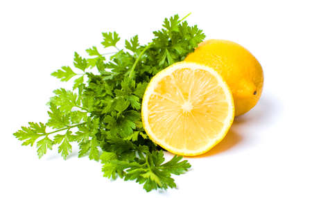 Lemon and parsley leaves isolated on whiteの写真素材