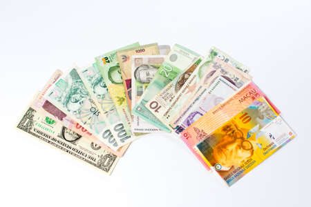 Various currencies banknotes isolated on white backgroundの写真素材