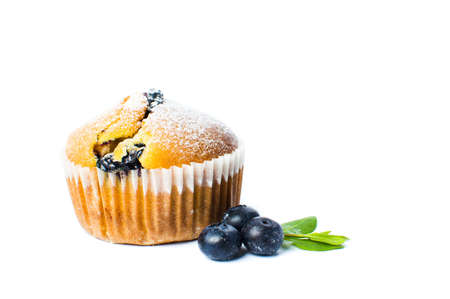 Blueberry muffins in paper holders isolated on whiteの写真素材