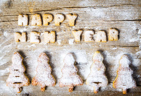 Happy new year note written with cookie lettersの写真素材