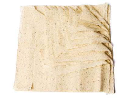 Raw pie crusts made of buckwheat flour isolatedの写真素材