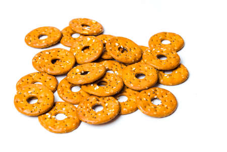 Round salty pretzels isolated on white backgroundの写真素材
