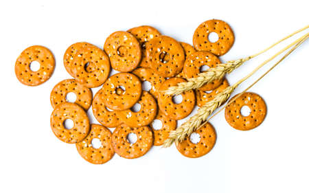 Round salty pretzels isolated on white backgroundの写真素材