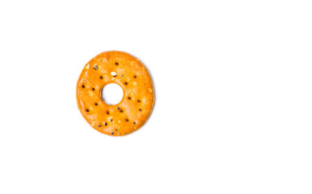Round salty pretzel isolated on white backgroundの写真素材