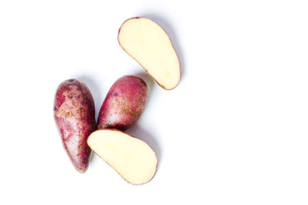 Raw red potatoes isolated on white backgroundの写真素材