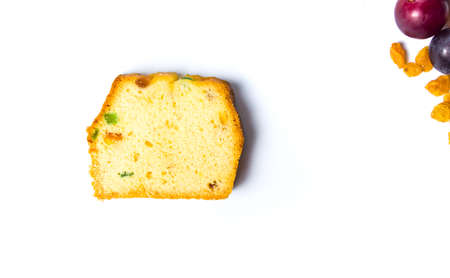 Homemade fruit bread sliced isolated on white backgroundの写真素材