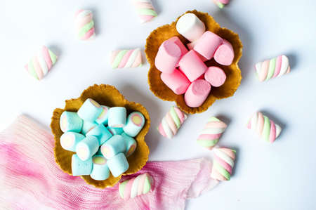 Colorful foam candy in edible bowl top viewの写真素材