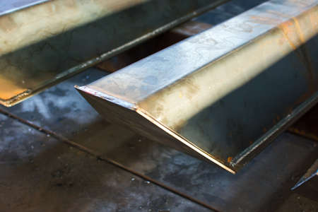 Freshly welded warm iron tube at the factory
