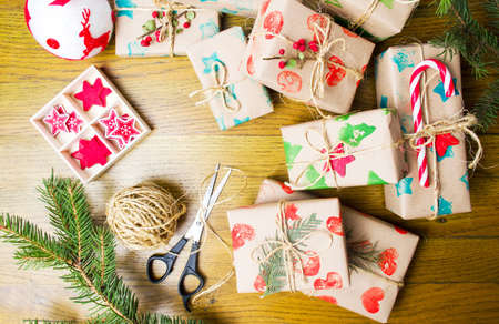 Packed Christmas presents on a table top view