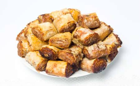 Baklava dessert slices on a plate isolated