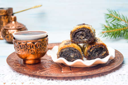 Baklava dessert and coffee served on copper kitchenware の写真素材