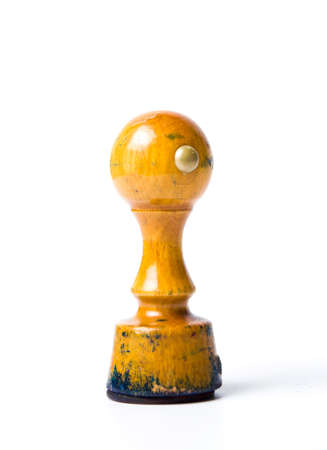 Old wooden stamp isolated on white backgroundの写真素材