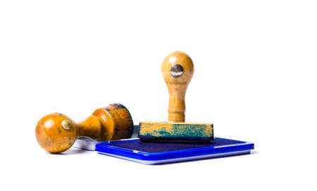 Old wooden stamp isolated on white backgroundの写真素材