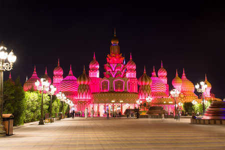 DUBAI, UNITED ARAB EMIRATES - NOVEMBER 6, 2017: Global village entrance at night. Popular tourist attraction in Dubai with shops and restaurants from around the worldのeditorial素材