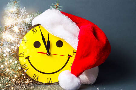 Smiley face clock and Sand hat with Christmas decorationsの写真素材