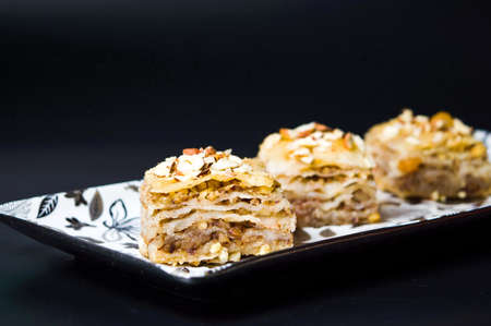 Baklava dessert slices with nuts on dark backgroundの写真素材