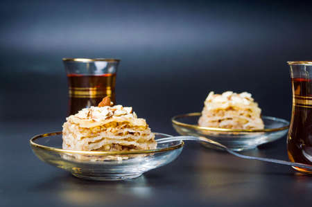 Baklava slices and tea. Arabian dessert timeの写真素材