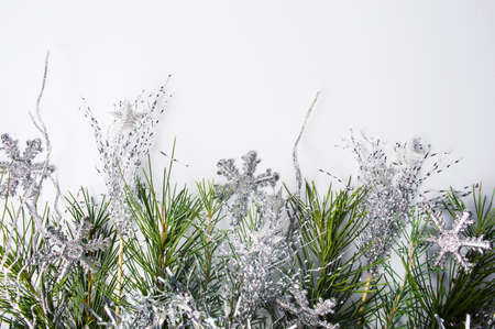 Silver Christmas decorations on white background top viewの写真素材