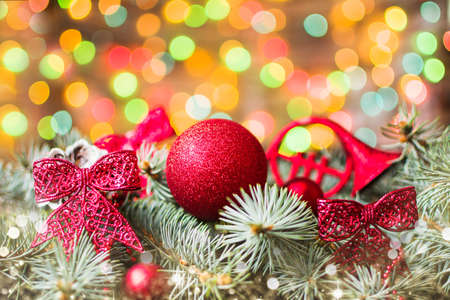 Red ribbons on a Christmas tree  with festive backgroundの写真素材