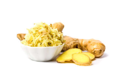 Chopped and shredded Ginger root isolated on white backgroundの写真素材