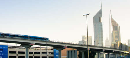DUBAI, UNITED ARAB EMIRATES - FEBRUARY 5, 2018: Dubai metro train running on the elevated viaduct in...