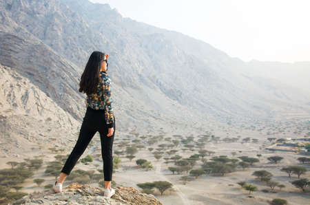 Girl enjoying scenery on a desert hiking trip