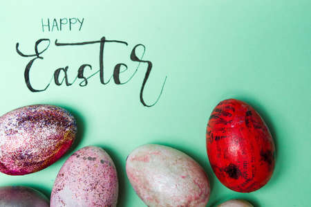 Happy Easter card with homemade painted eggsの写真素材