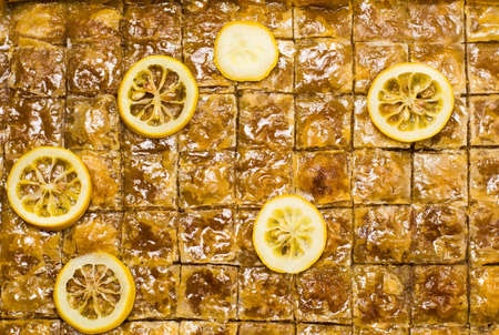 Whole baklava with lemon on a making texture patternの写真素材
