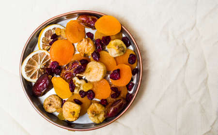 Various dried fruits in a bowl. Healthy dessertの写真素材