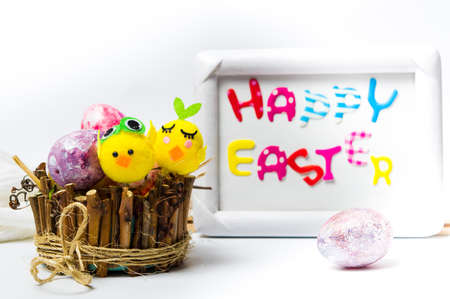 Happy Easter card with creative painted and decorated eggsの写真素材