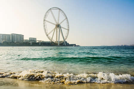 Ain Dubai ferris wheel at JBR beach with seaside viewの写真素材