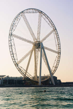 Ain Dubai ferris wheel at JBR beach with seaside viewの写真素材