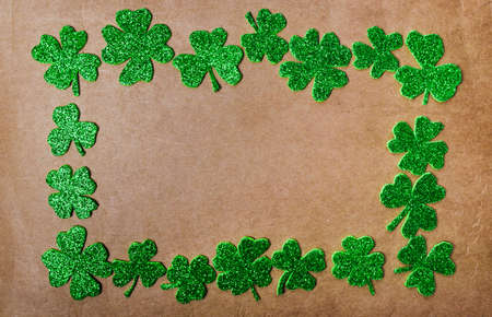 Clover background with copy space on brown background