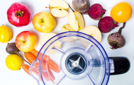 Empty blender and various fruit for making a perfect smoothieの写真素材