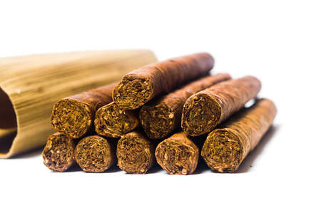 Cuban cigars on a pile isolated on white