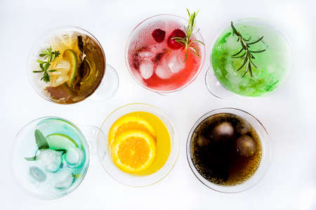 Colorful cocktails on white background top viewの写真素材