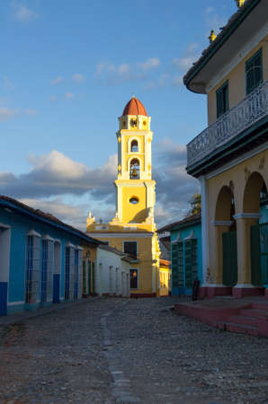 Yellow tower and blue houses taken in Trinidad Cubaの写真素材