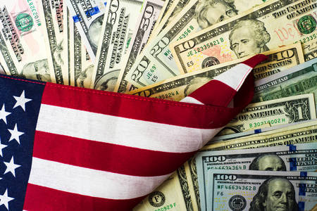American flag and banknotes USD currency moneyの写真素材
